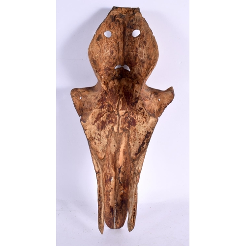 723 - A RARE 19TH CENTURY CONTINENTAL TRIBAL CARVED AND ENGRAVED HORSE SKULL decorated with animals and mo... 