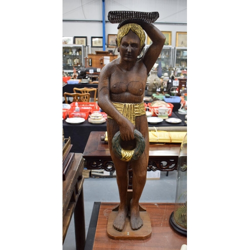 723E - A LARGE 1930S CARVED AND PAINTED OAK FIGURE possibly from a fair ground. 100 cm x 15 cm.