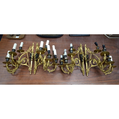 723H - FOUR COUNTRY HOUSE BRONZE WALL SCONCES. 37 cm x 18 cm. (4)