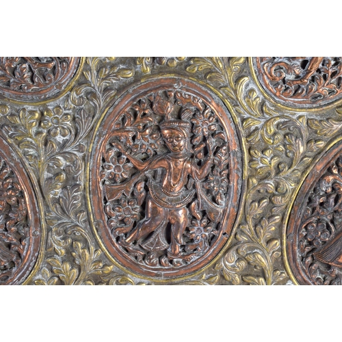 731 - A LARGE 19TH CENTURY MIDDLE EASTERN INDIAN MIXED METAL SCALLOPED CHARGER decorated with figures in v... 