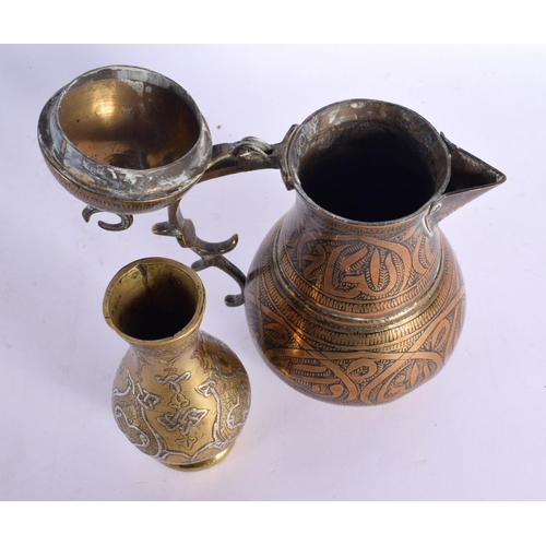 734 - A 19TH CENTURY MIDDLE EASTERN SILVER INLAID BRONZE VASE together with an Ottoman type jug. Largest 1... 