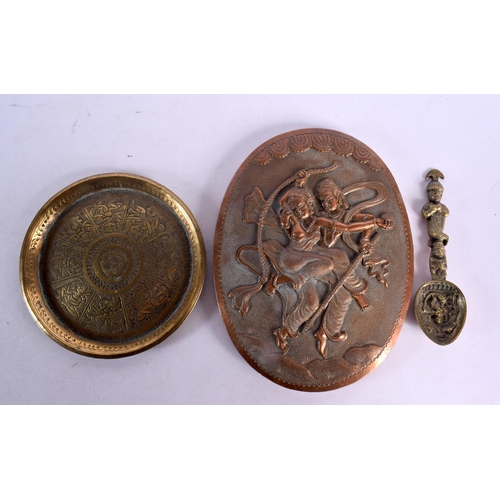 736 - A 19TH CENTURY INDIAN REPOUSSE DECORATED COPPER PLAQUE together with a bronze dish & spoon. Largest ... 