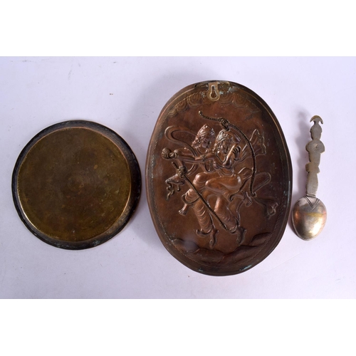 736 - A 19TH CENTURY INDIAN REPOUSSE DECORATED COPPER PLAQUE together with a bronze dish & spoon. Largest ... 