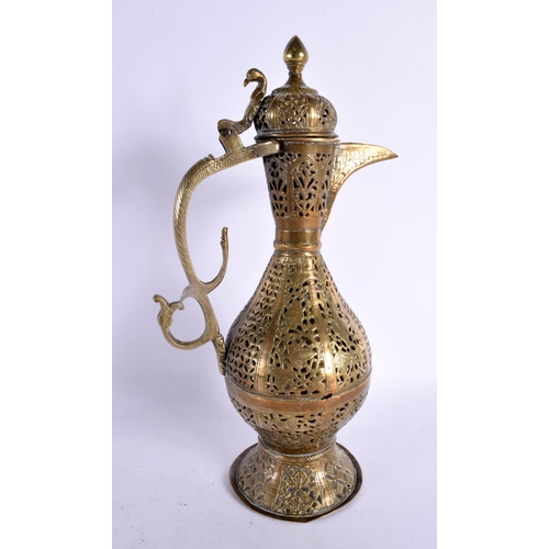 747 - A LARGE 18TH CENTURY MIDDLE EASTERN OTTOMAN TYPE BRONZE EWER decorated all over with foliage and vin... 