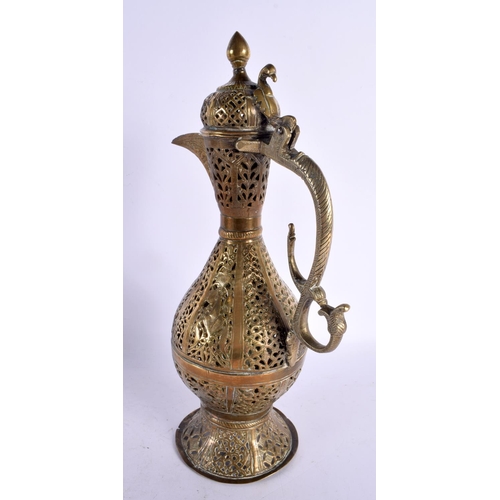 747 - A LARGE 18TH CENTURY MIDDLE EASTERN OTTOMAN TYPE BRONZE EWER decorated all over with foliage and vin... 