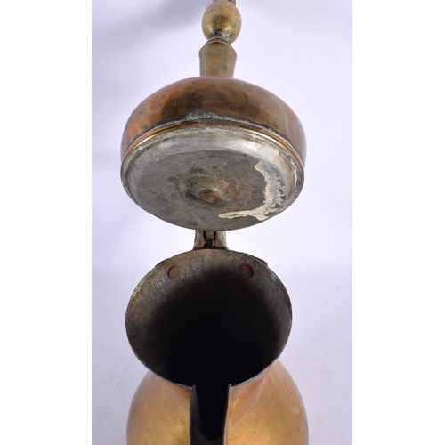 748 - A RARE SET OF FIVE 19TH CENTURY MIDDLE EASTERN OMANI TYPE BRONZE EWERS with large spouts. Largest 42... 