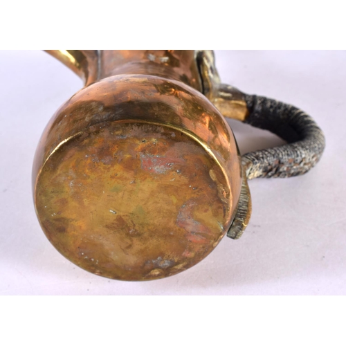 748 - A RARE SET OF FIVE 19TH CENTURY MIDDLE EASTERN OMANI TYPE BRONZE EWERS with large spouts. Largest 42... 