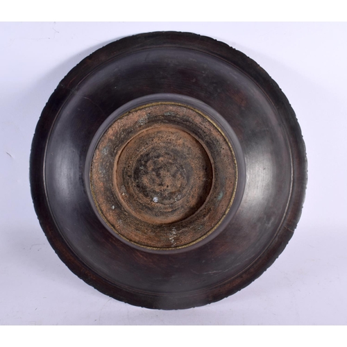 749A - A LARGE 18TH CENTURY MIDDLE EASTERN BRONZE SPITTOON of plain form. 30 cm x 15 cm.