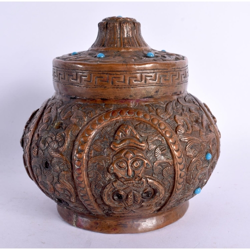 749G - A 19TH CENTURY TIBETAN NEPALESE COPPER ALLOY JAR AND COVER decorated with repousse figures and inlai... 