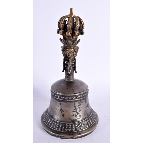 749E - A 19TH CENTURY TIBETAN BRONZE MIXED METAL BUDDHISTIC BELL with phurba type finial. 20 cm high.