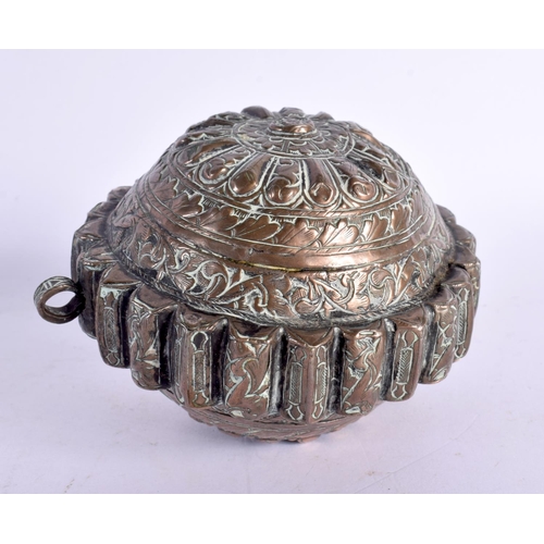 749F - A 19TH CENTURY MIDDLE EASTERN COPPER ALLOY BETEL LIME BOX possibly Bhutan. 10 cm wide.