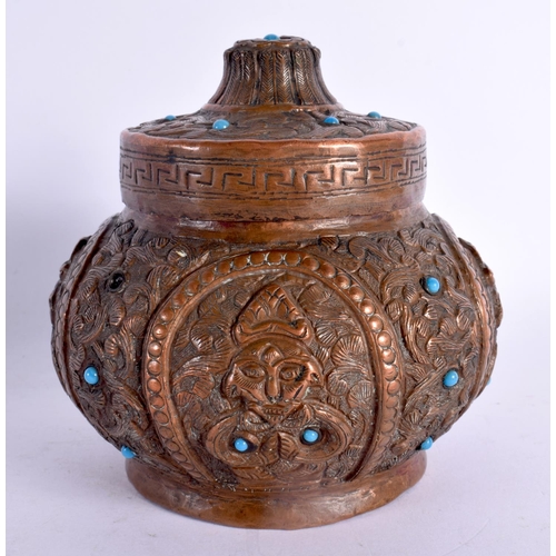 749G - A 19TH CENTURY TIBETAN NEPALESE COPPER ALLOY JAR AND COVER decorated with repousse figures and inlai... 