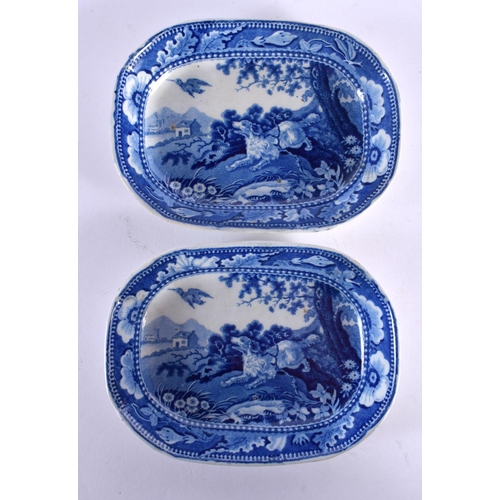 76 - A RARE PAIR OF 19TH CENTURY ENGLISH BLUE AND WHITE DISHES depicting hunting dogs. 13 cm x 10 cm.