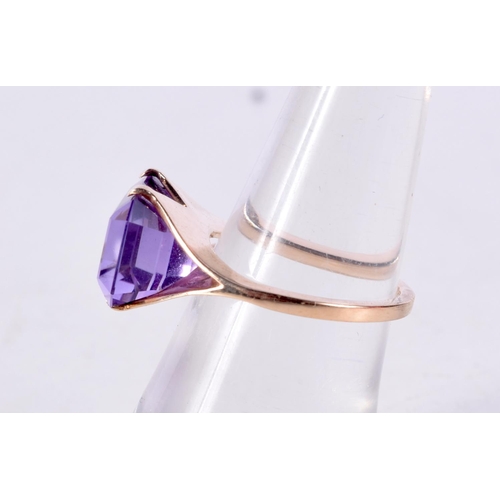 1001 - A 9CT GOLD AND AMETHYST RING. L/M. 4.2 grams.