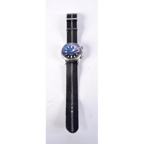 1011 - A DAN HENRY WRISTWATCH. 4 cm wide inc crown.