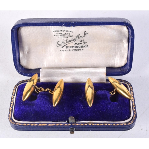 1014 - A PAIR OF 9CT GOLD CUFFLINKS. 3.5 grams. 2.25 cm x 0.5 cm.