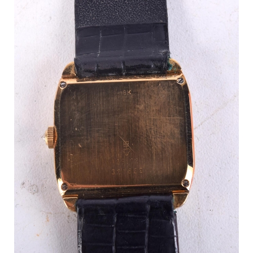 1022 - A 9CT GOLD CORUM WRISTWATCH. 29 grams. 2.75 cm wide inc crown.