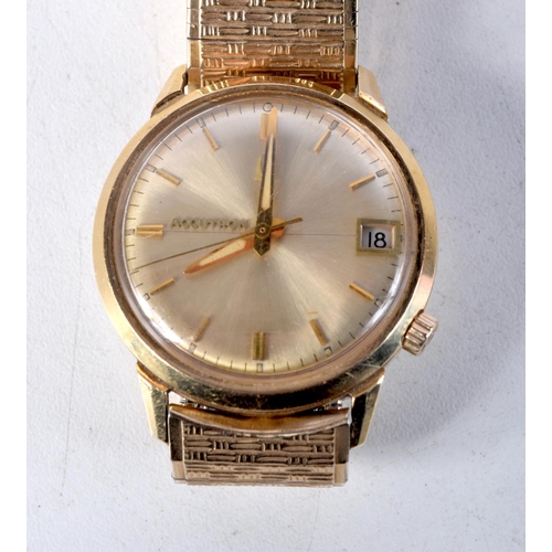 1036 - A 14CT GOLD ACCUTRON WRISTWATCH. 61 grams. 3.4 cm wide inc crown.