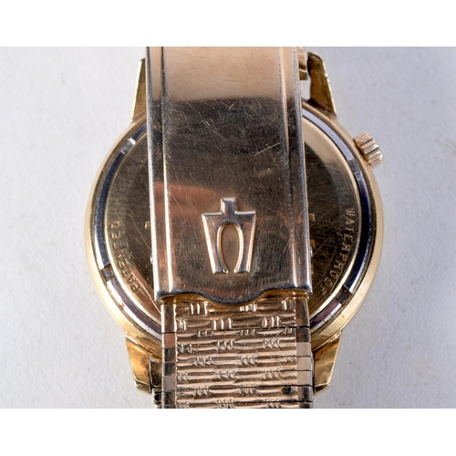 1036 - A 14CT GOLD ACCUTRON WRISTWATCH. 61 grams. 3.4 cm wide inc crown.