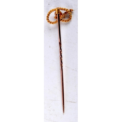 1041 - AN ANTIQUE GOLD STICK PIN. 1 grams. 5 cm long.