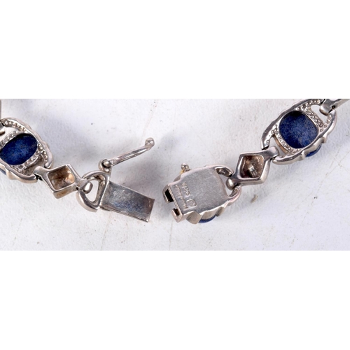 1046 - AN EARLY 20TH CENTURY CHINESE HONG KONG SILVER AND LAPIS LAZULI BRACELET Late Qing/Republican. 16 gr... 