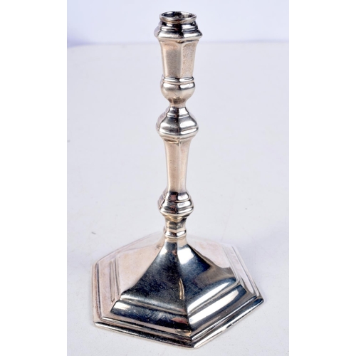 1063 - A STERLING SILVER TAPER STICK. 109 grams. 12 cm high.