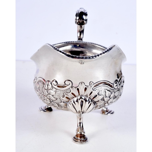 1067 - A LATE VICTORIAN SILVER REPOUSSE SAUCE BOAT by George & Nathan Ridley. Chester 1894. 268 grams. 18 c... 