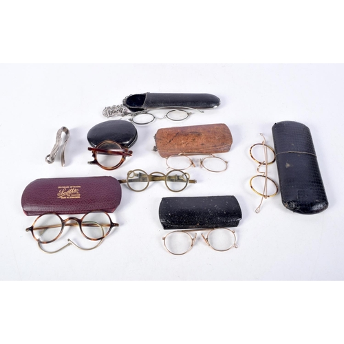 1069 - ANTIQUE SPECTACLES. Largest 13 cm x 13 cm. (8)