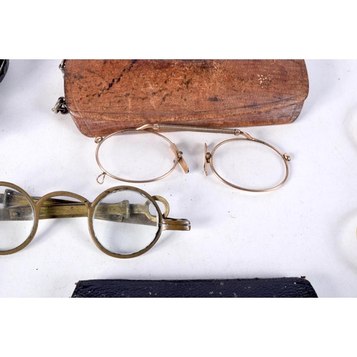 1069 - ANTIQUE SPECTACLES. Largest 13 cm x 13 cm. (8)