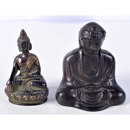 1072 - A 19TH CENTURY JAPANESE MEIJI PERIOD BRONZE BUDDHA together with another. Largest 8 cm x 7.5 cm. (2)