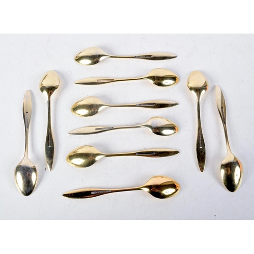 1095 - EIGHT DANISH SILVER GILT AND ENAMEL SPOONS. 92 grams. 9 cm x 1.75 cm. (8)