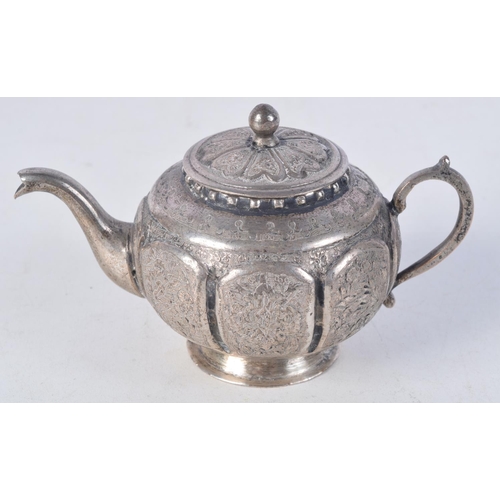 1110 - AN ANTIQUE PERSIAN WHITE METAL KETTLE ON STAND with tray and drinking bowl. 1085 grams. Largest 22 c... 