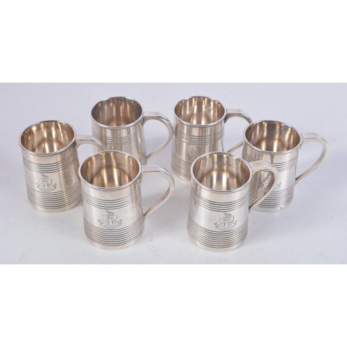 1116 - A RARE SET OF SIX MINIATURE VICTORIAN SILVER MUGS. London 1887. 260 grams. 5.5 cm x 4.5 cm. (6)