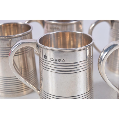 1116 - A RARE SET OF SIX MINIATURE VICTORIAN SILVER MUGS. London 1887. 260 grams. 5.5 cm x 4.5 cm. (6)