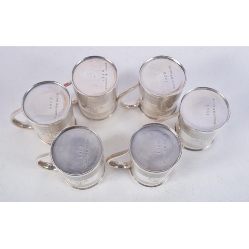 1116 - A RARE SET OF SIX MINIATURE VICTORIAN SILVER MUGS. London 1887. 260 grams. 5.5 cm x 4.5 cm. (6)