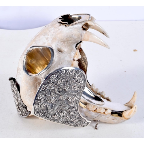 1122 - A RARE 19TH CENTURY INDIAN SILVER MOUNTED TIGER SKULL SMOKERS COMPENDIUM with associated silver spoo... 