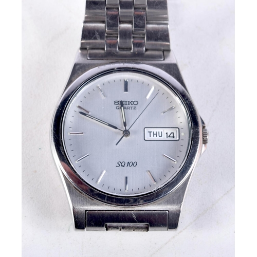 1125 - A SEIKO SQ 100 WRISTWATCH. 3.5 cm wide inc crown.