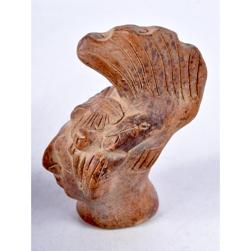 1127 - A SOUTH AMERICAN POTTERY BUST. 9.5 cm x 8.5 cm.