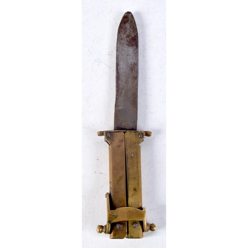 1129 - AN UNUSUAL ANTIQUE BRASS FOLDING KNIFE. 9.5 cm x 3 cm closed.