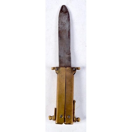 1129 - AN UNUSUAL ANTIQUE BRASS FOLDING KNIFE. 9.5 cm x 3 cm closed.