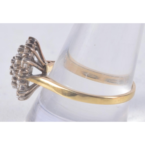 1136 - AN 18CT GOLD AND DIAMOND CLUSTER RING. 4.9 grams. R.