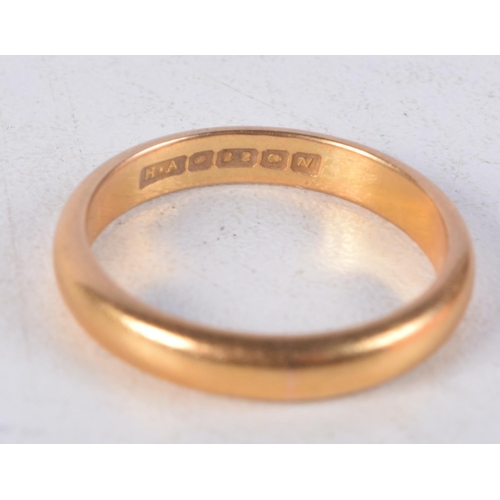 1143 - A 22CT GOLD WEDDING BAND. 6.2 grams. S.