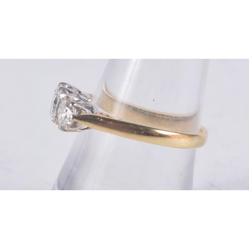 1146 - A GOOD 18CT GOLD AND DIAMOND THREE STONE RING. 3.4 grams. N.