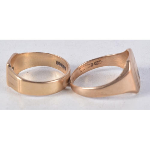 1148 - TWO 9CT GOLD AND DIAMOND RINGS. 10.6 grams. T & U. (2)