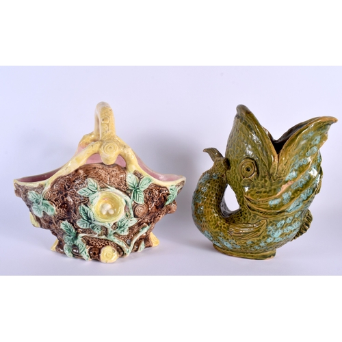 1 - AN ANTIQUE MAJOLICA POTTERY BASKET together with a grotesque pottery fish jug. Largest 22 cm x 15 cm... 