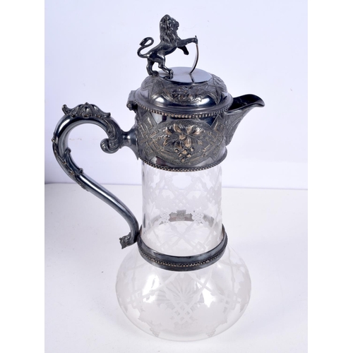 1178 - AN ANTIQUE SILVER PLATED ENGRAVED GLASS CLARET JUG. 913 grams. 29 cm x 18 cm.