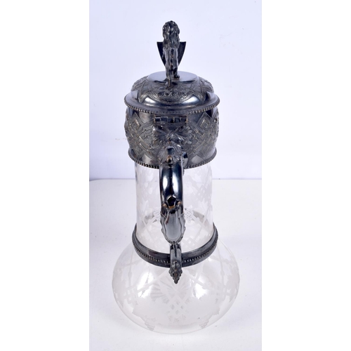 1178 - AN ANTIQUE SILVER PLATED ENGRAVED GLASS CLARET JUG. 913 grams. 29 cm x 18 cm.