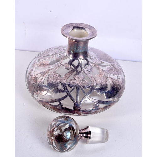 1189 - A VINTAGE SILVER OVERLAID GLASS SCENT BOTTLE. 569 grams. 15 cm x 15 cm.