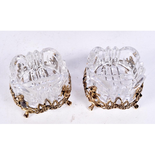 1211 - A PAIR OF ANTIQUE CONTINENTAL SILVER GILT SALTS. Silver 38 grams. 6 cm x 4 cm.