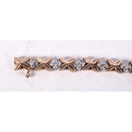 1221 - A LOVELY 9CT GOLD AND DIAMOND BRACELET. 11.4 grams. 18 cm long.